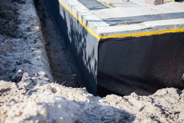 Professional Waterproofing technician working in Warminster, PA